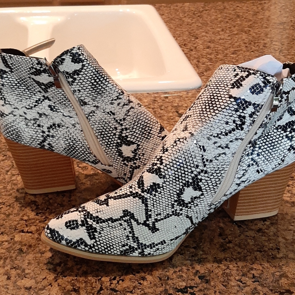 Snake print heeled booties